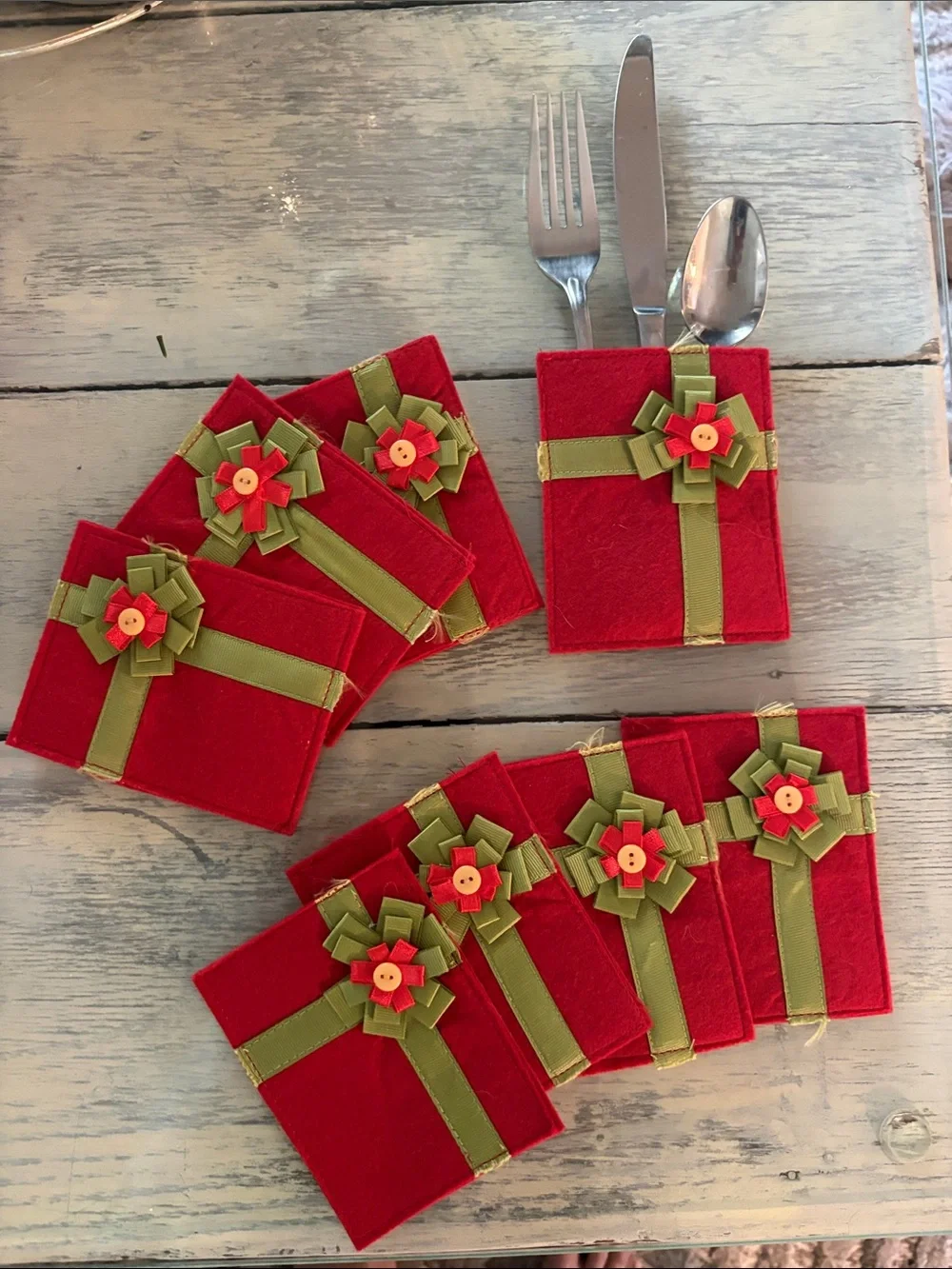8 Red Felt Utensil Holder with Green Ribbon Accent